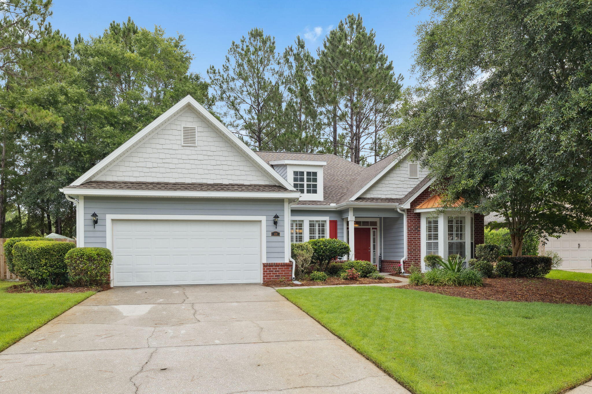 Welcome to 419 Symphony Way, a Stunning 4 Bedroom, 2.5 bath home on the pond in Symphony. This is a delightful Home in an amazing Community. You will find it offers its own General Store, Middle School, Dentist office, Props Brewery, fabulous pools & clubhouse with Movie Room. Just a short Walk, Golf Cart or Bike ride around the corner to The Central HUB. The Amenities offer an expanded fitness center, basketball, tennis, and pickle ball courts. Enjoy the Weekend Market on the green, taking breezy walks along the well maintained trails and boardwalks or relax by the pool of choice. The additional items of reference are New Paint,Plantation shutters-New Roof-Gas Stove Fireplace & Heat-New Lawn Irrigation -Fresh Sod Front yard-Fully Fenced Yard Overlooking the Water.