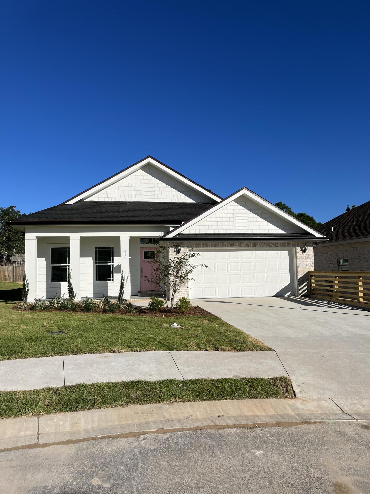 Niceville's newest subdivision set up high on a hill overlooking Boggy Bayou. Minutes away from Eglin AFB and the water! This home is only one-year old and located in the Hideaway Ridge community, single entry neighborhood, on a very private cul-de-sac. Open floor plan; 5 bedrooms and 3 baths with beautiful quartz countertops throughout and a built-in fireplace. Multi-level yard includes balcony with wooded views and private lower-level patio with large box planter. 10 ft ceilings on main floor. Appliances included: stove with hood, fridge, dishwasher, microwave, washer and dryer.Lawn care, landscape and sprinkler system maintained by owner. Small dogs will be considered with a one-time pet fee. No smoking.Owner pays HOA fees.