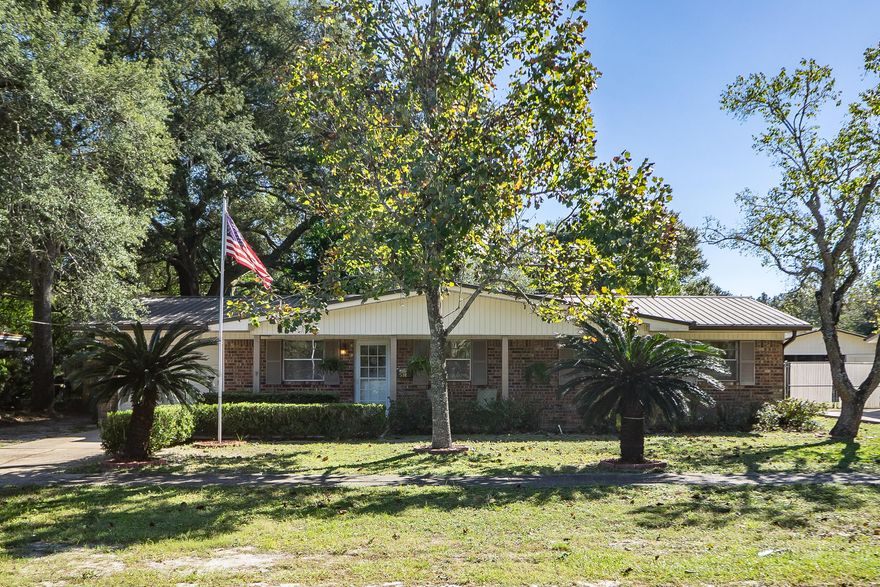 Home sweet Niceville is what you'll say after you visit this 4 bedroom, 2 bath all brick ranch in heart of town within minutes to schools, parks, shopping, Publix, Wal-Mart and dining. Major components of the home have been updated recently. Hot water heater less than 1-yr old, Metal roof 4-yrs old, and Hvac with heat pump 4-yrs old. Huge (.024 acre) fenced in back yard with double gate with plenty of room for kids, pets and a pool! Open patio with SunSetter retractable awning (installed 2015) for those lazy afternoons on the porch. Detached workshop with plenty of storage, one-car garage. (laundry located in the garage) This home is just a short commute to Eglin AFB, Duke Field, Destin and the world's most beautiful beaches. Schedule your showing today! Home sold in as-is condition.
