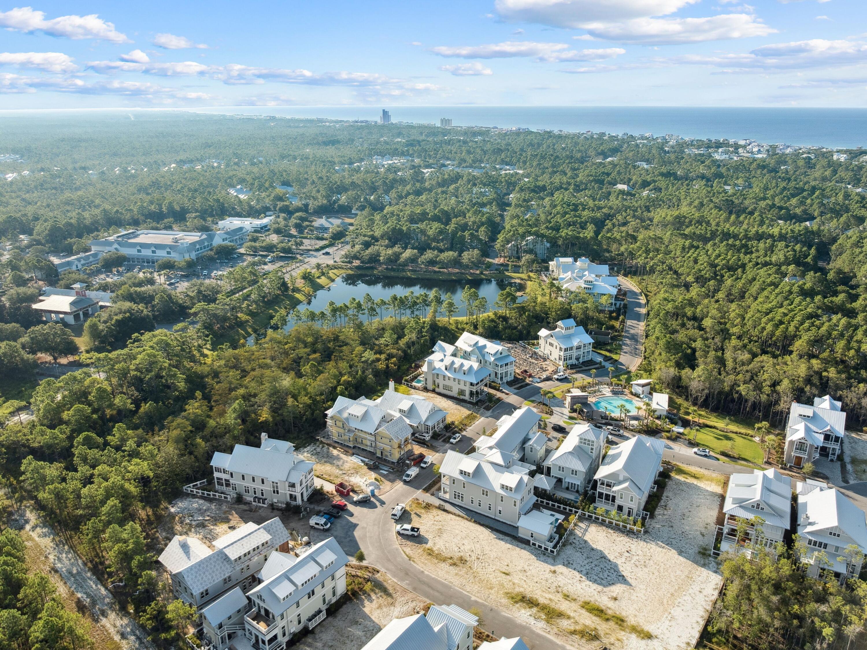 Enjoy owning in the exclusive community of WaterColor. This Lot is located in the new and last phase in Watercolor; Phase 5.T he Park District has only 41 custom homes sites in the only rental restricted phase of WaterColor. This is one of only a few that back up to the woods behind WaterColor and just across from the only Homeowners pool in Watercolor. This lot offers the homeowner a tremendous amount of privacy while still enjoying the many highly sought after Watercolor Amenities. Special Assessment has already been paid!