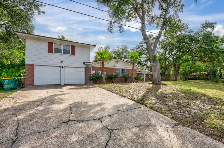 Lower your living expenses with this solar panel home. This property is equipped with 50 plus solar panels, which can be paid off at closing by the seller. The estimated electric bill for this size home is a minimum of $350, now $25 allowing you to leverage the savings towards your mortgage. Ask the agent for the documented proof provided. The roof will also be replaced at closing. The pool has recently been refinished in 2020, and the cement patio was extended for additional pool furniture or creating a backyard oasis on this spacious, privacy-fenced corner lot in a great neighborhood less than half a mile from the bayou. This space is climate controlled with newer central air and a mini split upstairs, and a hot water heater that was replaced in 2020.  As you enter the home, to the right are three bedrooms, including the master with a new tile shower with dual shower heads and an updated full bathroom. To the left, you walk into the family room with built-in shelves and a faux fireplace, and an oversized dining room with a kitchen featuring a breakfast bar. Through the French doors, you enter a large office, also with built-in shelves. Continuing through the home, you enter the mud room that gives you access to the garage, backyard, and another oversized suite above the garage, which has an updated bathroom and rebuilt deck. Under the balcony has great outdoor storage. This home has great potential to create a sanctuary for an abundance of people and offers the ability to leverage the electric savings for a lower cost of living.