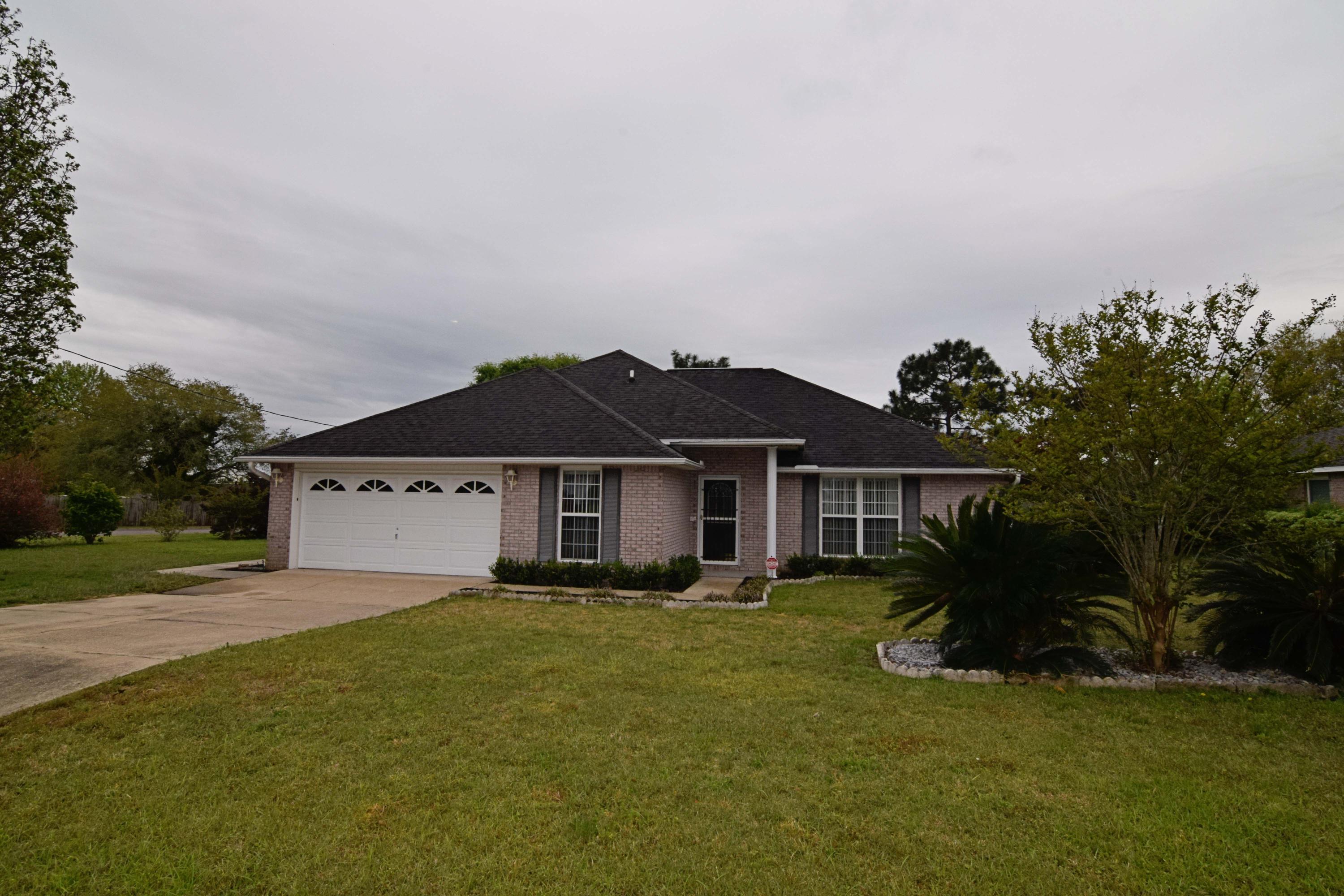 Welcome Home! This 4br/2ba, original owner home is located on the easy to access south side of I-10, minutes to Duke Field, 7th Special Forces Group & only 20 minutes to Eglin AFB. This home is clean! New granite in kitchen and some new appliances. Updated flooring throughout living room and several bedrooms. Vaulted 16 ft. ceiling in living room opens to huge 12X14 loft/game area, adorned with a radiant skylight! Lots of space- all bedrooms have walk-in closets! 4th bedroom could also be used as an office. Relax in your added Florida Room. Backyard is home to an amazing 23x13 workshop complete with its own electrical panel. Added systems include, water softener, security, and sprinkler. ! All measurements to be verified by buyer.