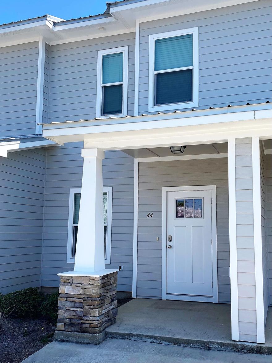 Great townhome available NOW! You'll enjoy the light and bright living space with an open floor plan. Home has LVP flooring throughout for easy living and cleaning. The first floor features a well-appointed kitchen, with breakfast bar, living room/dining room combo, and half bath. The two bedrooms and two full baths are located upstairs, along with laundry area. Out the back door you'll find a private patio and small grassy area. Unit is a short distance to the community pool. Located just minutes to the beaches via the 331 bridge. Dogs allowed on case-by-case basis, with deposit. No cats. No smoking or vaping. Tenant pays utilities. First month, security deposit, and cleaning fee required. Apply online at apartments.com. Owner is a licensed real estate agent.