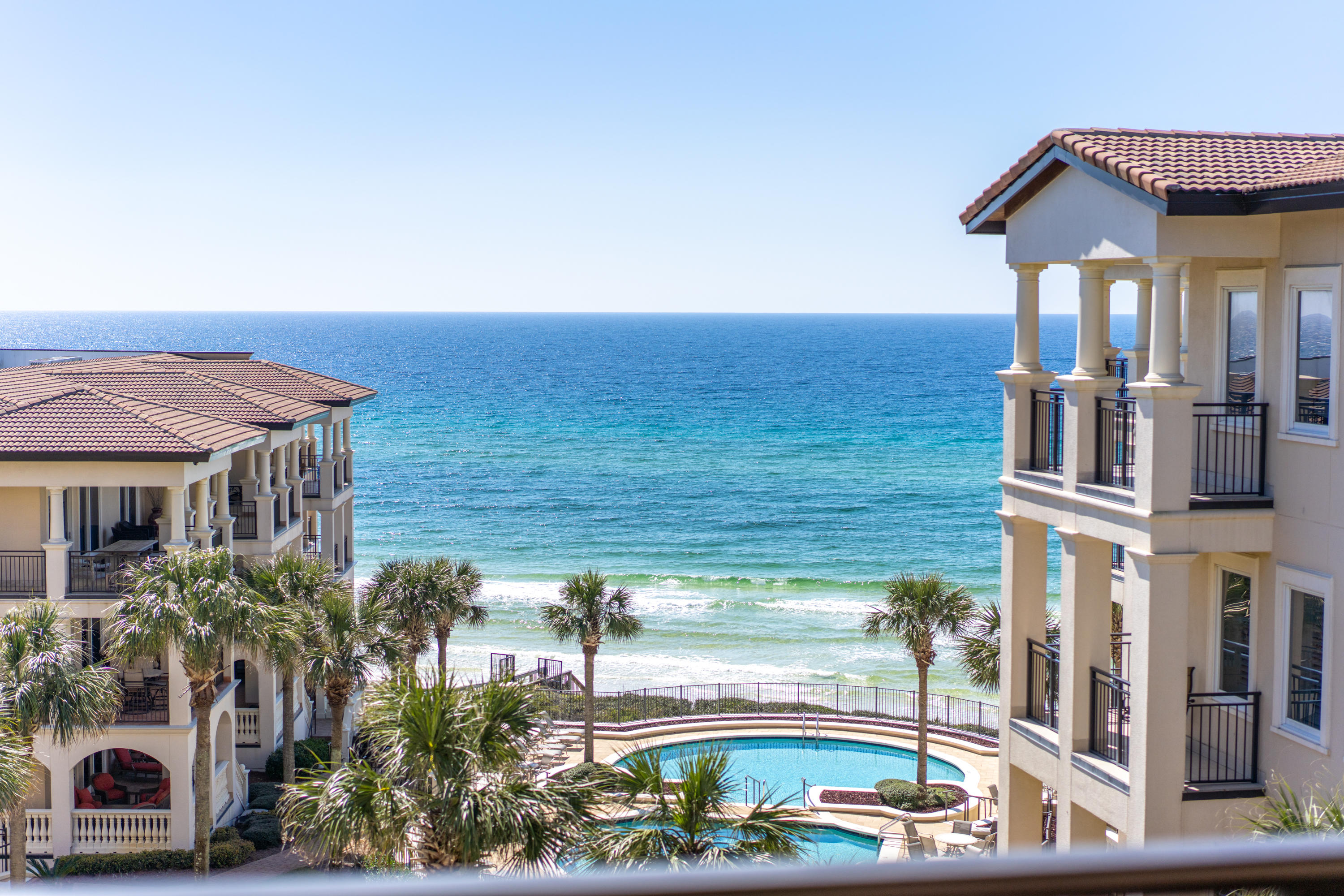 Accepting back-up contracts. BELLA VITA B401- Step up to luxury living on 30A on the top floor on the west corner! Beautiful Gulf, piazza, fountain and pool views enliven the senses. This immaculate fully furnished, 3 bedroom 3.5 bath is a highly desirable west end condominium home. The D floor plan is loved for being the westernmost end residence in the B building. The oversized 355 sq. ft. balcony allows ample space for outdoor living overlooking piazza vistas and gulf views. B401 is a pure second home as the owner NEVER rented. The well-conceived design boasts 2,611 square feet of living space with hard surface flooring throughout. continued - click more.... The lifestyle is all about family, entertaining and effortless beach living. Bella Vita located in Blue Mountain Beach boasts 6 acres, 365 feet of beach with only 48 residencesgarage parking, and is situated on the highest point on the US Gulf Rim offering dramatic views.
Cook and look at the gulf! The gourmet kitchen designed by Linn's Prestige Kitchens features top of the line appliances including Dacor five burner gas cook top and two built in Dacor self-cleaning convection wall ovens, plus Sub Zero refrigeration matching the custom wood cabinets. The large kitchen effortlessly marries the spacious dining and living room providing plenty of room for gathering with family and friends. The Seller added hard surface flooring in all the bedrooms complimenting the Italian porcelain tile and replaced the master bath countertops. Wake up to azure gulf views! The graciously sized master bedroom suite enjoys the ultimate in privacy with a niche separating the entry from the living room. Light floods the master bedroom as it enjoys wide doors to the terrace and additional west facing windows. The master bath boasts separate shower, private water closet with window, dual vanities and large whirlpool tub. Each of the guest bedrooms features a private en suite bathroom and beautiful tile floors. There is spacious storage inside and out and the underground garage parking is excellent. There are 108 parking spaces at Bella Vita. B401 is located in the center building offering privacy and easy access to the Great Hall featuring a library and kitchen. Located conveniently on the second floor the Fitness Center is well equipped to encourage work out enthusiasts to stay fit while at the beach. The gym is received at $80,000 remodel! Bella Vita is pristine and looks and feels brand new with tile throughout all corridors and balconies as well as maintenance including exterior paint. Jump into the heated pool for year around enjoyment! Whether you wish to lounge by the pool, relax at the beach, or bike along 30A, discover coastal towns, bike on the 30A bike path, walk to the bakery, health food store, eateries, donut or ice cream stands then retreat to B401...your happy place on 30A! Association fees also include all utilities except electricity. Stunning coastal elegance awaits you at Bella Vita! We invite you to make an appointment to see this top floor westernmost condominium, B401, and make plans to live the Beautiful Life at Bella Vita!