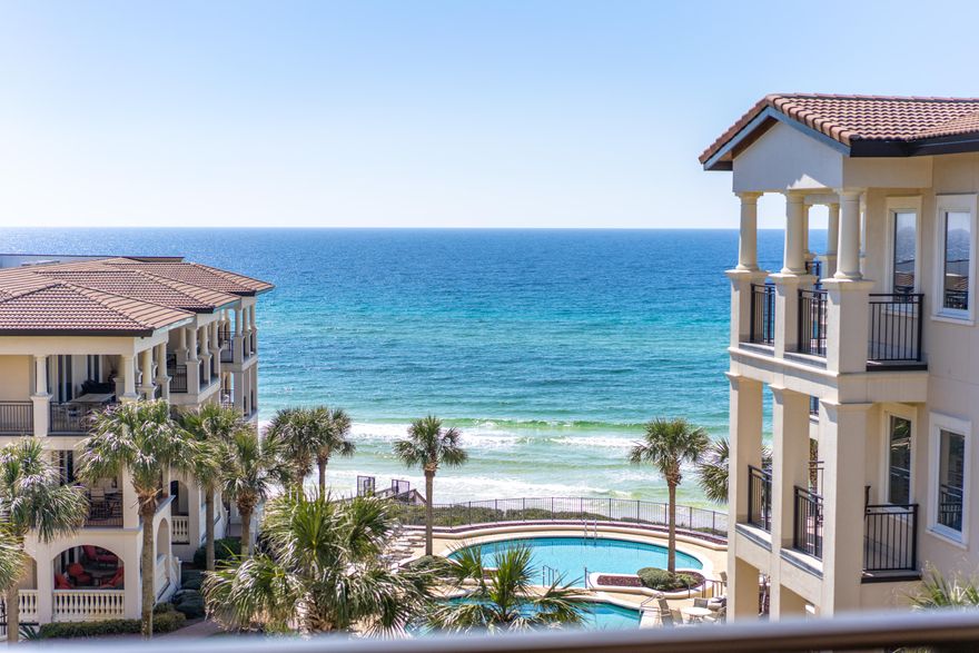 Accepting back-up contracts. BELLA VITA B401- Step up to luxury living on 30A on the top floor on the west corner!  Beautiful Gulf, piazza, fountain and pool views enliven the senses. This immaculate fully furnished, 3 bedroom 3.5 bath is a highly desirable west end condominium home. The D floor plan is loved for being the westernmost end residence in the B building. The oversized 355 sq. ft. balcony allows ample space for outdoor living overlooking piazza vistas and gulf views.  B401 is a pure second home as the owner NEVER rented. The well-conceived design boasts 2,611 square feet of living space with hard surface flooring throughout. continued - click more....  The lifestyle is all about family, entertaining and effortless beach living. Bella Vita located in Blue Mountain Beach boasts 6 acres, 365 feet of beach with only 48 residencesgarage parking, and is situated on the highest point on the US Gulf Rim offering dramatic views. 

Cook and look at the gulf! The gourmet kitchen designed by Linn's Prestige Kitchens features top of the line appliances including Dacor five burner gas cook top and two built in Dacor self-cleaning convection wall ovens, plus Sub Zero refrigeration matching the custom wood cabinets. The large kitchen effortlessly marries the spacious dining and living room providing plenty of room for gathering with family and friends. The Seller added hard surface flooring in all the bedrooms complimenting the Italian porcelain tile and replaced the master bath countertops. Wake up to azure gulf views! The graciously sized master bedroom suite enjoys the ultimate in privacy with a niche separating the entry from the living room. Light floods the master bedroom as it enjoys wide doors to the terrace and additional west facing windows. The master bath boasts separate shower, private water closet with window, dual vanities and large whirlpool tub. Each of the guest bedrooms features a private en suite bathroom and beautiful tile floors. There is spacious storage inside and out and the underground garage parking is excellent. There are 108 parking spaces at Bella Vita. B401 is located in the center building offering privacy and easy access to the Great Hall featuring a library and kitchen. Located conveniently on the second floor the Fitness Center is well equipped to encourage work out enthusiasts to stay fit while at the beach. The gym is received at $80,000 remodel! Bella Vita is pristine and looks and feels brand new with tile throughout all corridors and balconies as well as maintenance including exterior paint. Jump into the heated pool for year around enjoyment! Whether you wish to lounge by the pool, relax at the beach, or bike along 30A, discover coastal towns, bike on the 30A bike path, walk to the bakery, health food store, eateries, donut or ice cream stands then retreat to B401...your happy place on 30A!  Association fees also include all utilities except electricity. Stunning coastal elegance awaits you at Bella Vita! We invite you to make an appointment to see this top floor westernmost condominium, B401, and make plans to live the Beautiful Life at Bella Vita!