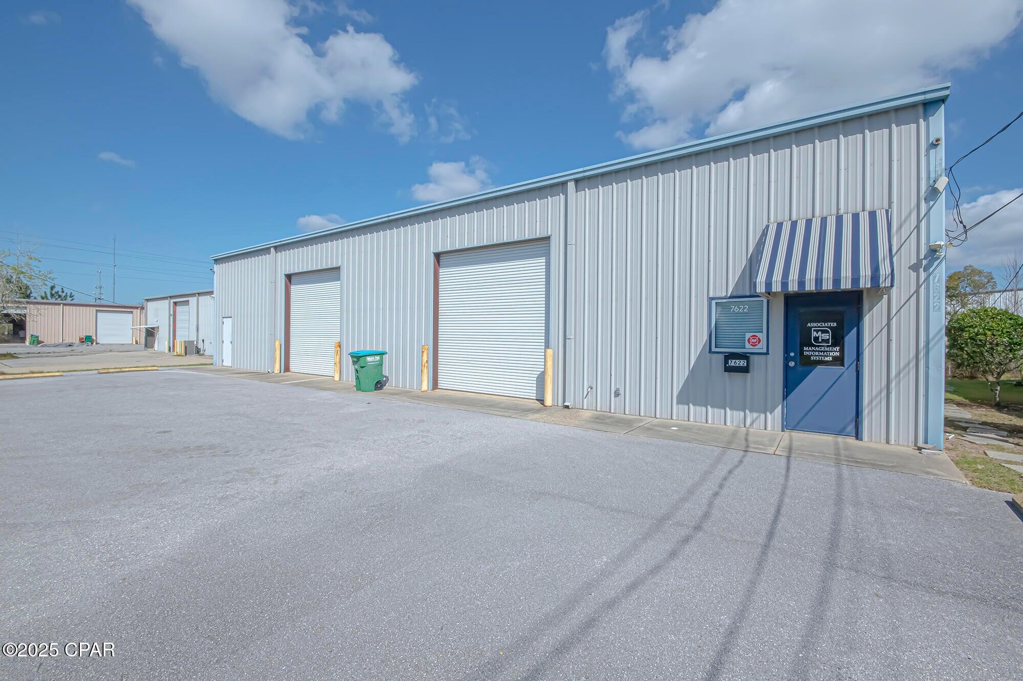 5,000 Square Foot commercial 'Flex' building for lease, which includes +/-3,500 sq. ft. of office space and +/-,1,500 sq. ft. of warehouse space. One street-level 12' x 14' rollup door. Mezzanine storage above some of the office. The old trailer in the back is to be removed. Breakroom, 2 ADA restrooms, one includes a shower. Zoned C-4, Research & Design within unincorporated Bay County. Call for additional information and to setup a tour.