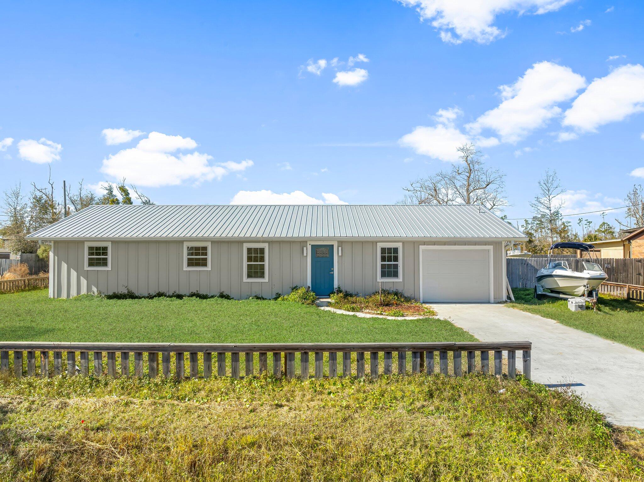 **Motivated Seller!**  Welcome to this remarkable 5-bedroom, 3-bath residence that sits on 0.69 acres of land. It features a metal roof (2022), HVAC system (2022), and water heater (2022).Effective year built - 2018The generous, fully fenced backyard includes a newly added barn (2023), providing flexible options for storage, hobbies, or even farm animals. Outdoor lovers will appreciate being just a 5-minute drive from John B. Gore Park, offering easy access to fishing and boating.Inside, the home showcases a spacious floor plan highlighted by luxury vinyl plank flooring and bright LED recessed lighting, creating an inviting atmosphere. The thoughtfully designed split layout features two expansive suites, ideal for multi-generational living, along with additional bedrooms for guests.The laundry room is both stylish and functional, featuring a decorative barn door, while the kitchen is designed for cooking and entertaining, boasting shaker cabinets, stunning quartz countertops, a chic tile backsplash, stainless steel appliances, and elegant light fixtures.
This property seamlessly combines spaciousness, comfort, and versatility.