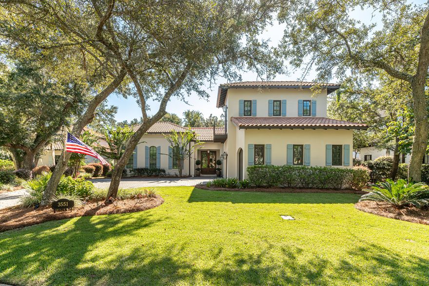 Located in the exclusive neighborhood, The Preserve at Burnt Pine, in the renowned Sandestin Resort, this recently painted elegant custom home is set amid moss draped oaks. With beautiful vaulted and beamed ceilings, a gorgeous fireplace, and an open concept living, dining, and kitchen area, it's perfect for contemporary living and entertaining. The chef's dream kitchen boasts a Wolf range and Sub Zero refrigerator, along with a bar area featuring an ice maker and wine cooler. The spacious primary bedroom suite on the first floor features a lovely marble bath and a generous closet. There's also a large guest suite on the main floor with a pretty ensuite bath, walk-in closet and access to screened in porch and pool area. Upstairs, two more bedrooms complete the elegant living space.