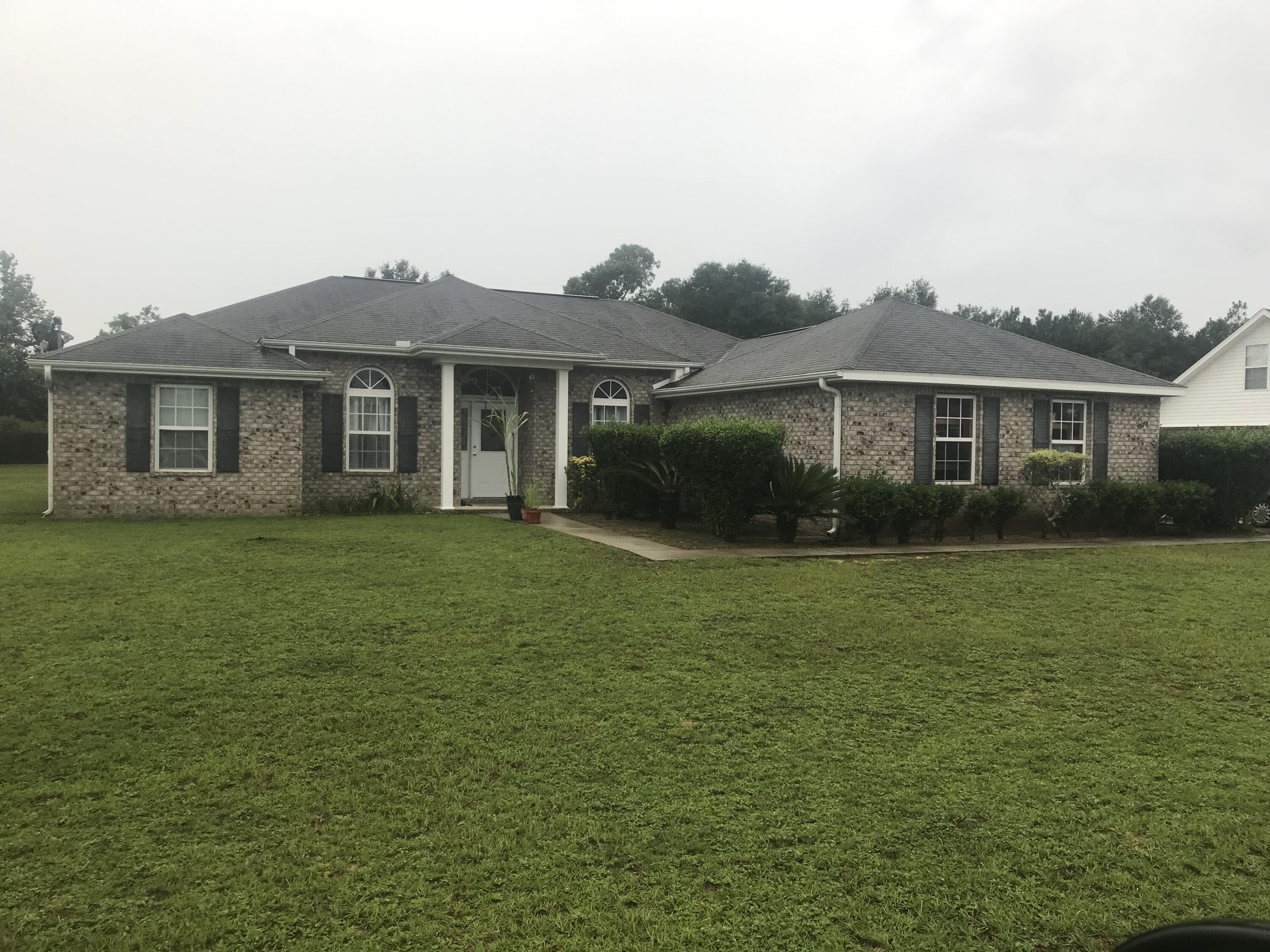 Nice 3BR/2BA all brick home located in the Baker School District. Some features this home offers is vaulted/coffered ceilings, laminate flooring in living area, carpet in bedrooms, title in wet areas, Corian counter tops, 1/2 acre level lot, separate formal dining and office. New HVAC system installed in 2019. Seller is a licensed real estate agent in the state of Florida