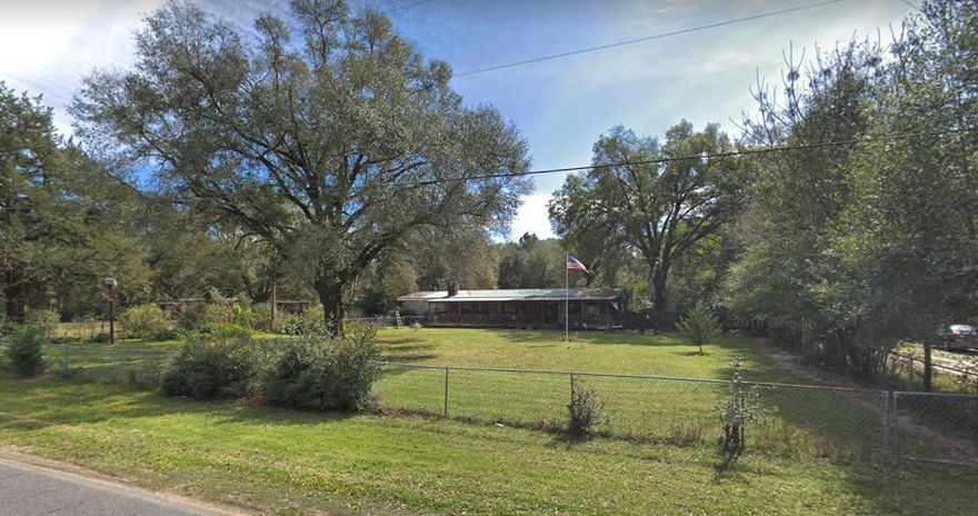 Roll up your sleeves and turn this property into your forever home or utilize it as your next flip property. This property is currently a 3 bedroom and 2 bath with just over 1,880 sq ft. The home will need updating throughout however at this price you could have plenty of equity built up with some renovations. The lot size is just under 1 acre, with a fenced in back yard and fenced front yard. Brick exterior and a full porch across the front.