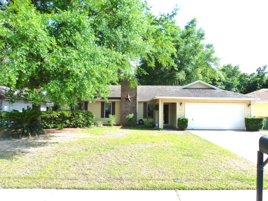 This centrally located home is walking distance to restaurants and shopping, in an established neighborhood. The entrance opens into a large living room with a brick fireplace and custom built shelving. The updated kitchen is bright and roomy with an island and plenty of cabinets and counter space. The large dining area will easily facilitate entertaining. The master bedroom has a beautiful bay window with bench seating. The master bedroom closet has custom shelving. The additional bedrooms are spacious enough for queen beds. All hard flooring throughout, no carpet. The back deck leads to a screened in porch that overlooks a beautiful private backyard. This home is close to Eglin, Duke Field, 7th Group and Northwest Florida State College. Schedule your appointment to see this lovely home!