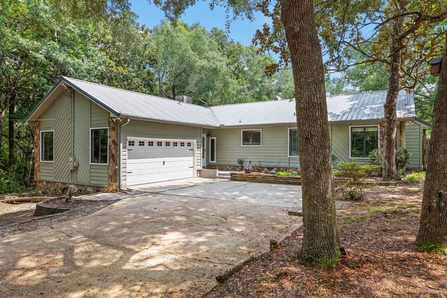 Absolute serenity in a convenient location! Beautiful 4b/2b home in highly sought-after Bluewater Bay, Niceville. Come enjoy your coffee and listen to Florida's songbirds on your shaded deck, with a private view of the mature magnolia trees. Enjoy a Pinterest-perfect living room with vaulted ceilings with a cabin-like wood-look ceiling! The kitchen is a chef's dream with tons of counter space, easy access to both dining and the living room, and stainless steel appliances! Enjoy an amazing night's rest in your Primary Bedroom, and unwind from the day in the spa-like bathroom with a huge soaking tub and luxurious fixtures! 4 bedrooms means room for the whole family, and the backyard is a great place to hang out! Owner will consider pets with restrictions. Any pet must be spayed/ neutered and current on all shots, requires a non-refundable pet fee. Any person at least 18 years old must apply separately. Tenants required to carry renter's liability insurance.