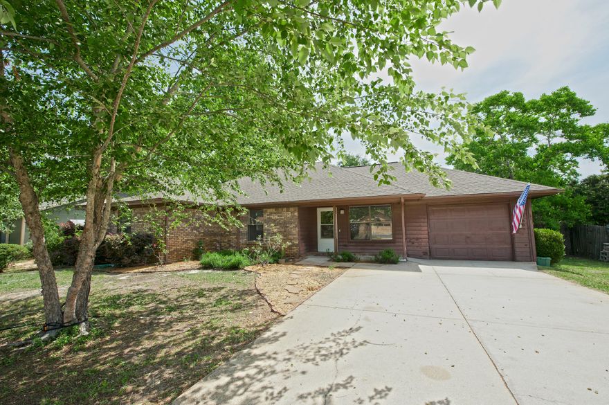 Updated home for sale in Mary Esther, FL. New paint, new carpet, new flooring, new lighting and more! This open floor plan provides a large great room that is right off of the kitchen. The kitchen features granite counters a newer stove and a view to the backyard. Off of the great room you can step out onto the screened in porch that looks out onto the fenced backyard with storage shed. Back inside you will appreciate the huge master bedroom with master bathroom. Located on a quiet street only minutes to Hurlburt Field and our beautiful beaches. FREE one year home warranty included. Why rent when you can buy for less $$ each month?? Call today to make your appointment.