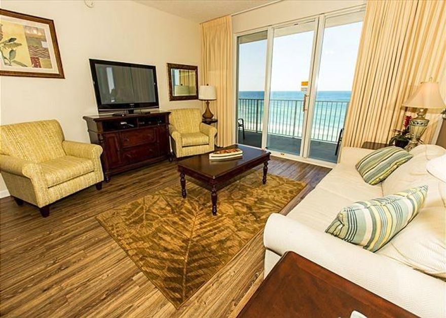 Open your balcony doors to breathe in the Gulf of Mexico air! This two bedroom ''Deluxe'' gulf front condo offers a recently remodeled kitchen with granite countertops and stainless steel appliances. With new wood flooring and updated furnishings, you will relax well in both the master bedroom and living room with their amazing gulf views and extended balcony. Offered fully furnished, this unit is turn-key and rental ready with projections exceeding $50,000 annually.Majestic Sun features a heated pool, 2 hot tubs, fitness facility and a conference room. Located on the beautiful Seascape Resort with amenities including restaurants, golf & tennis.