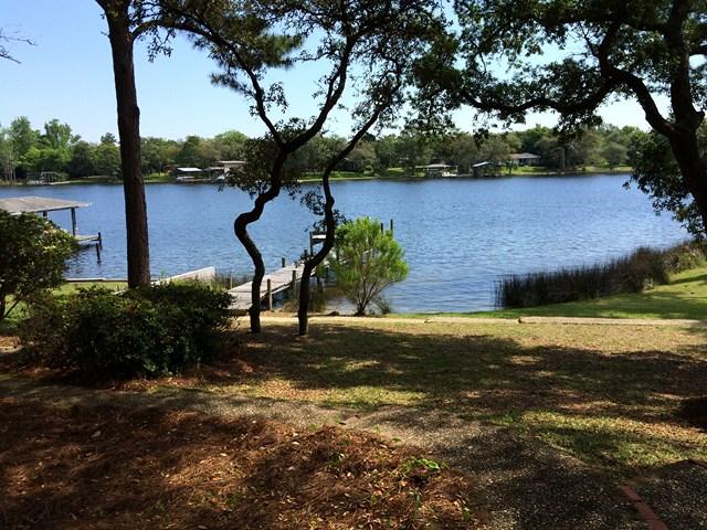 Majestic waterfront home tucked away in established neighborhood on Cinco Bayou. Beautiful lot with wonderful view. Excellent location within minutes to schools, hospital, shopping, groceries and dining. Great home for large gatherings. One-of-a-kind rental. Kitchen has walnut cabinets with built-in folding pantry, sliding drawers for storage, lazy susan and kitchen island. Owner will consider a small dog on a case-by-case basis with a $350 non-refundable pet deposit. Home has ''as is'' security system wiring available, however services would be set up and paid for by the tenant, owner will not repair or replace wiring. Large laundry area with washer/dryer hookups and plenty of storage space. Refrigerator is ''as is'' and will not be repaired or replaced by the owner. No Smoking. Easy appl
