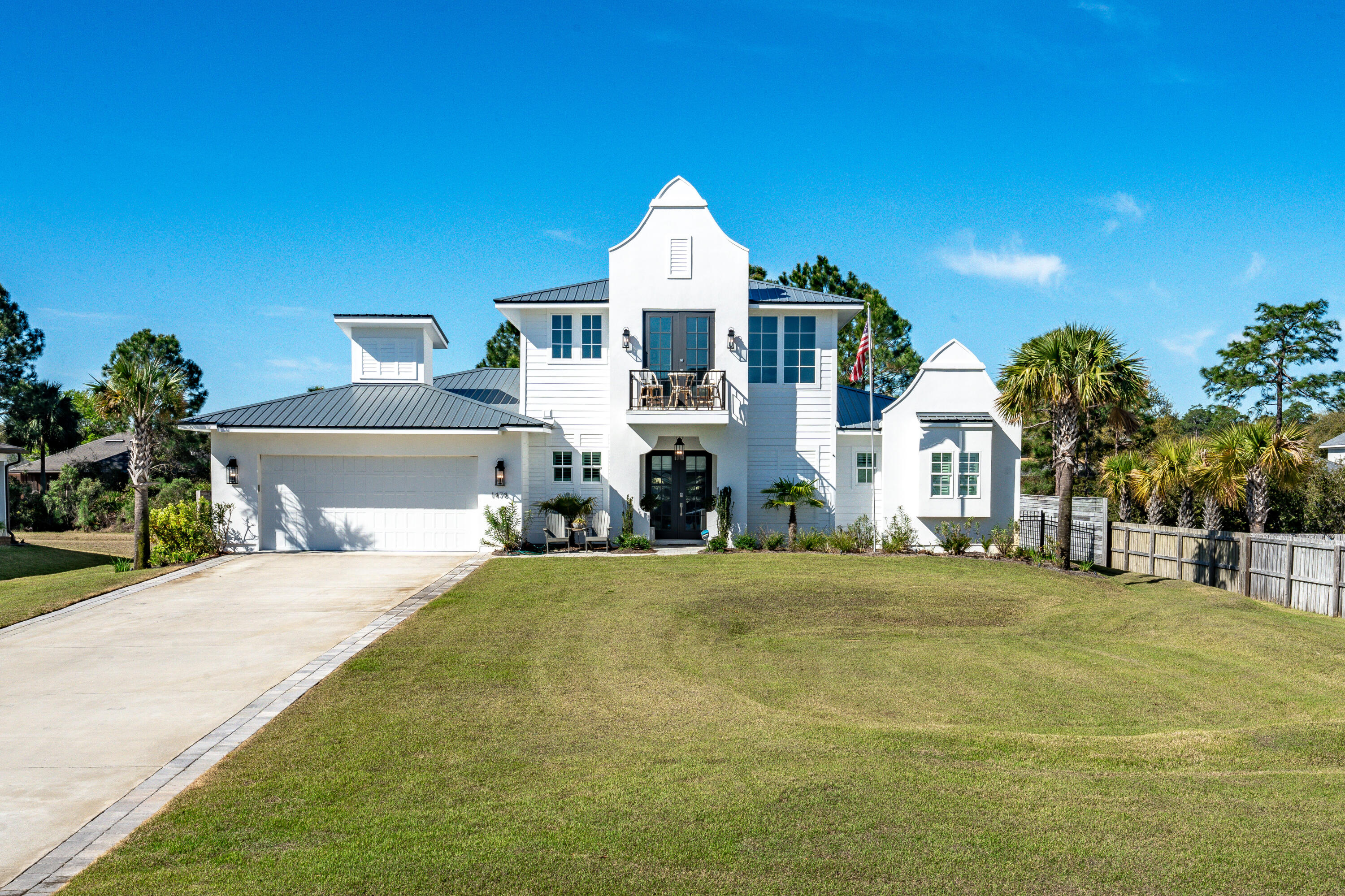 WOW Factor Alert! Casual elegance best describes this 2022 custom build located on over 1/2 acre with in-ground pool, stunning Bay views, and NO HOA. The owners used their expertise when building the home and added architectural improvements and design features which set this showplace apart from the rest. Envision a day in your beautiful home. Rise in the morning in the first-floor master bedroom bathed in natural sunlight looking out at the sparkling pool through the French doors. Cozy up on a brisk January afternoon by the gas fireplace in the great room. Relax on the second level Juliette balcony in the early evening with your beverage of choice while gazing out to the tranquil waters.The gleaming kitchen island is the perfect gathering spot for The gleaming kitchen island is the perfect spot for conversation while whipping up culinary delights. The easy flow continues to the outdoor covered living area with built-in kitchen which includes a gas grill, ice maker and mini fridge. Patio sunshades will help keep the pool at a delightful temperature during the summer months, which is also heated for year-round enjoyment.
Additional notable features include a coffee bar in the mudroom accessible to the kitchen through the glass paned door, finished storage areas, upgraded tile/cabinetry/fixtures and electric elements, a glass shower door in the master bath, a coffered master bedroom ceiling, closet shelving, loft built in bar with mini fridge, termite baiting system, overhead garage storage system, lush tropical foliage and landscaping, and a fully fenced backyard with plenty of room for play and furry family members. There is also room to build a pool house if so desired. Full list of notable features, architectural changes from the original design, and improvements available.
Community amenities include a waterside park complete with playground, walking path, multi-purpose fields, basketball court, pavilions, bbq grilling areas, pickleball, pond with fountain and green space with parking and restrooms.
Local points of interest:
Driftwood Estates Park 0.6 miles
Sacred Heart Hospital 3.7 miles
Grand Boulevard 4.7 miles
Topsail Hill Preserve State Park 5.7 miles
Silver Sands Premium Outlets 6.6 miles
Cessna Landing Boat Launch 9.9 miles
Whether you are wanting to purchase a full-time residence or second home on the Emerald Coast, this gorgeous property will impress the most discriminating buyer desiring the Florida lifestyle. All information is believed to be accurate. Buyer to verify pertinent information.