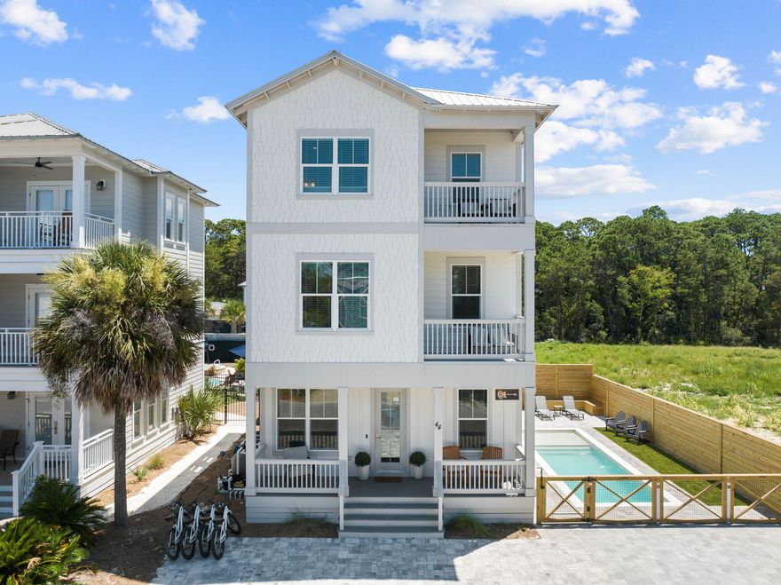 Discover the epitome of coastal elegance at 44 Abbey Rd, a 4-bedroom, 3.5-bath home that exemplifies refined living in a coveted location. Nestled just steps away from 30A and the Emerald Coast, this exceptional property combines timeless design with modern convenience.As you step inside, the open living, kitchen, and dining area welcomes you with a seamless flow and an abundance of natural light. The kitchen, adorned with sleek stainless steel appliances, reflects a perfect balance of style and functionality, making it a chef's dream.