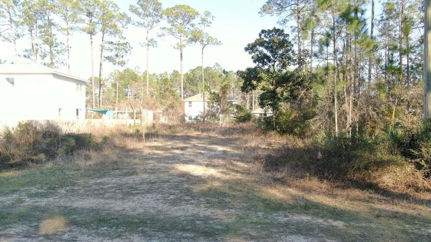 LEVEL AND CLEAR LOT, in Santa Rosa Beach, FL. Ready to built, plans ready,  Located just 3
miles to HWY 98. Only 6 miles to the word renown white sugary beaches of the Florida Emerald Coast, this lot could be a nice site for your residence, a beach
vacation home, or an income producing property.