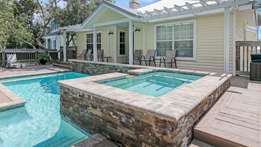 Great Rental Income history. This home is located in the popular Kokomo Cove neighborhood in the Crystal Beach area and just 2 blocks to the beach. Sunlight filled, Florida cottage with split level floor plan, 3 bedrooms and 3 1/2 baths and sleeps 13. Private pool located in the front yard surrounded by a large deck and mature Oak trees. There is a king in the spacious master bedroom with updated private bath, a queen room with a private bath and a bunk room with two sets of bunks and a private bath. Vaulted living room.  Hot tub with waterfall feature spilling into large pool. Tree shaded deck surrounding pool. Hardwood floors throughout.