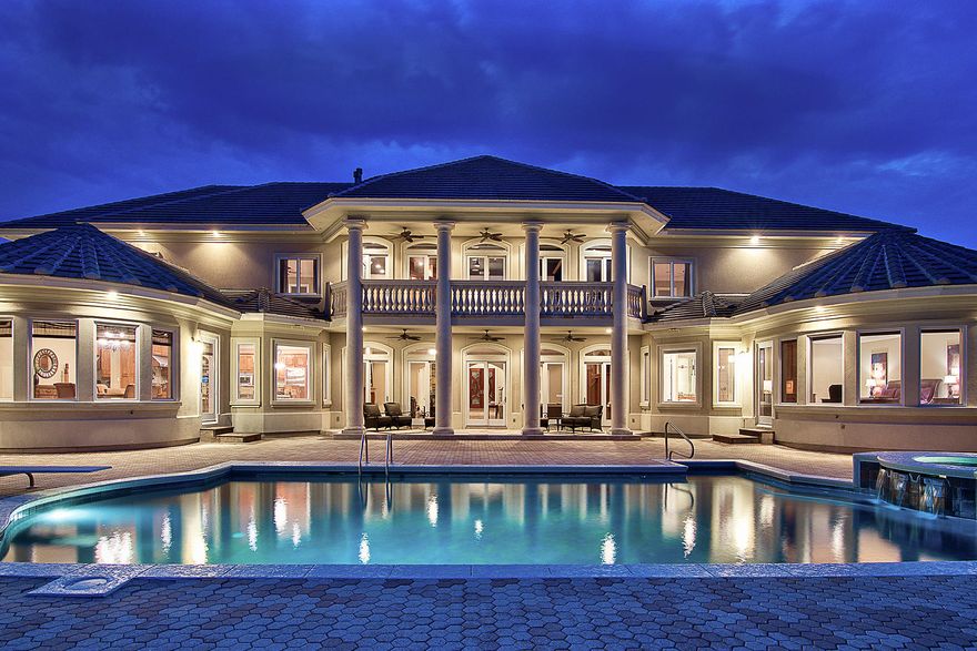 Presiding over 300' on the pristine waters of the Choctawhatchee Bay, this magnificent Waterfront Estate features unparalleled panoramic vistas ideally situated at one of the highest Bay front elevations on the Emerald Coast. The epitome of privacy, this Estate was thoughtfully designed with a compound style gated entry and occupies over two acres of carefully groomed gardens & natural foliage. Centrally located in Destin this home is most notably in excellent boating proximity to Destin's famous Crab Island and the surrounding protected deep water bayous as well as the Destin Jet private airport. The impeccable architectural design was masterfully executed by Stephan Schoeppler with construction completed by CD Jones. The front facing elevation features large columns that flank