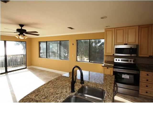 Outstanding Gulf front condo in intimate 9 unit building! Situated on the end of a 3 story building atop a dramatic bluff, this 1 bedroom has great features in the open living room, open kitchen, separate storage & a balcony overlooking a world class beach! The condo has recently been renovated with SAMSUNG APPLIANCES, NEW CABINETS,TRAVERTINE FLOORING AND GRANITE COUNTER TOPS making this well priced condo one of the Best Gulf Front Buys on the Market TODAY !