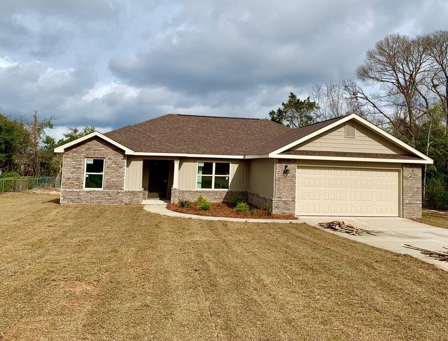 THIS 4 BEDROOM 2 BATH HOME IS ON A FLAT LOT! White Shaker Style Cabinetry,Stainless Steel Appliances Smooth Top Range, Allen and Roth Laminate Throughout the Living Room, Hallways and Kitchen. 20 x 20 Tile in Bathrooms and Laundry Room, Nickel and Chrome Fixtures, Bedrooms have been upgraded to Frieze Carpet. Large Open Concept Kitchen and Living Room with Vaulted Ceilings. Front Porch. 2 Car Garage with Automatic Opener. ALMOST 1600 SQ FT BUT FEELS MUCH LARGER WITH VAULTED CEILINGS IN THE LIVING ROOM AND TREYED CEILING IN THE MASTER. YARD WILL BE PROFESSIONALLY LANDSCAPED ! PRELIMINARY INSURANCE ESTIMATE IS $600.00 PER YEAR, AND LOW COUNTY TAXES.. Photos are of similar home