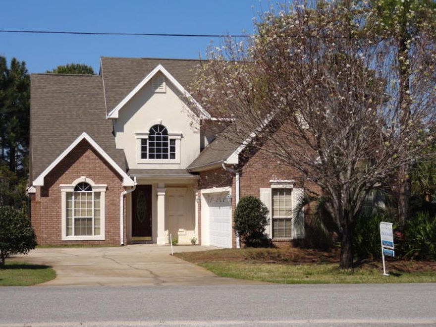 ONE OF THE BEST LOCATIONS IN MIRAMAR BEACH...CLOSE TO THE BEACH AND THE BAY! Your family will love this 4 bedroom 2 1/2 bath home in Olde Florida Lakes. Conveniently located only minutes to shopping, golfing and restaurants! The yard is private and landscaped, so you can enjoy the screened porch. The unique ceilings in the foyer and living areas make a great first impression in this home. The kitchen is well equipped with solid surface counter tops and a breakfast bar open to the living area. The master bedroom has treyed ceilings and crown molding adding elegance to the room. There is a slight view of the Bay from the second floor and the 4th bedroom is large enough to be used as a media or game room. The location of the home allows additional access to the beach via golf cart.