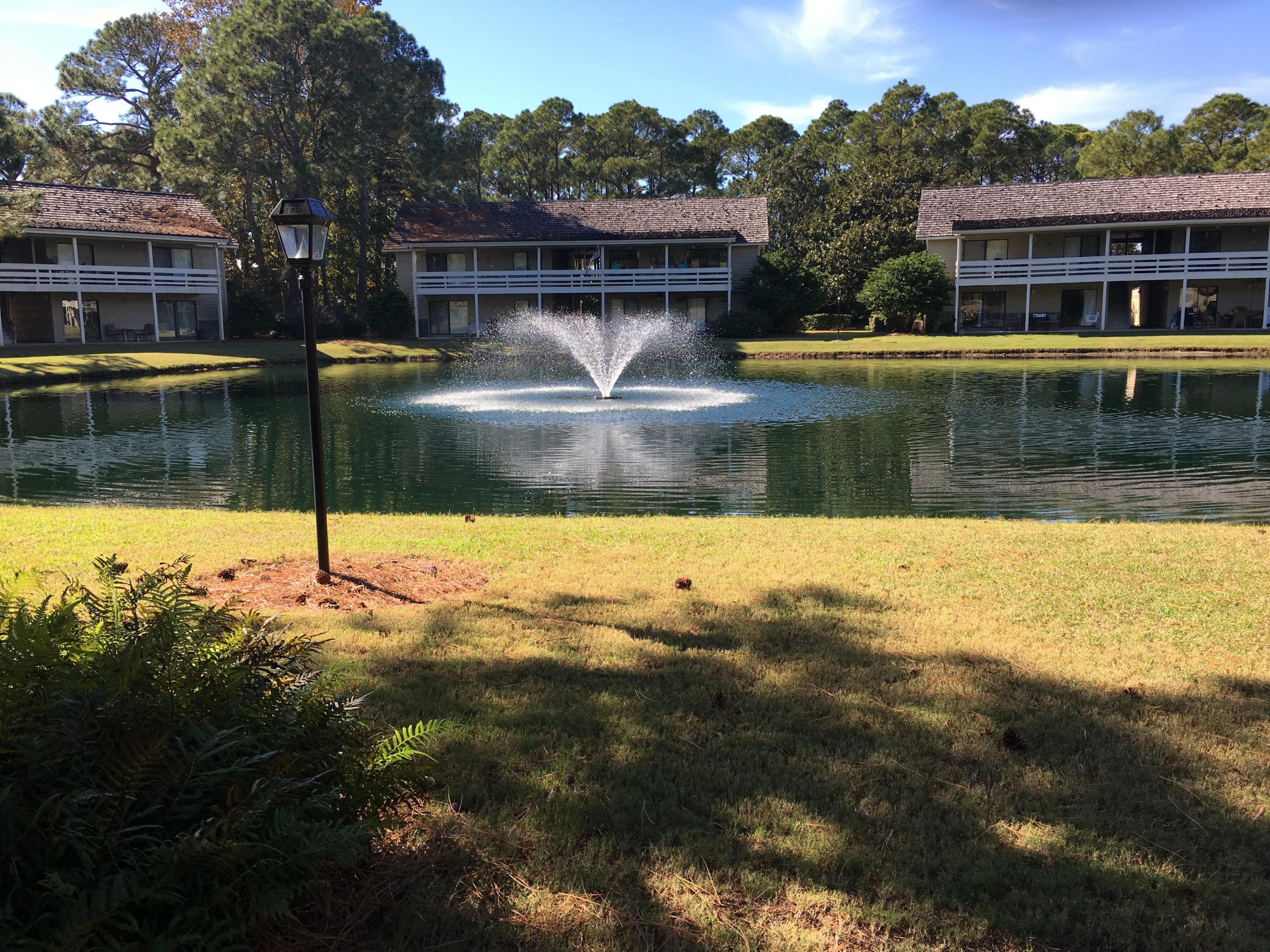 Highly desirable 3 bedroom Garden Villa on the first floor across from Golden Pond on the 17th green. Steps to the pool and white beaches. Gated entrances w security . 5 pools, deeded beach, pickleball, basketball courts, golf course, on site dining, Seascape's Towne Centre, and more. the villa has been upgraded with granite, floors, and stainless appliances.