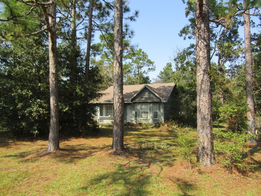 Near Kings Lake boat launch across from Sunset King Resort.  Cute cedar sided country/cottage style home with 2 bedrooms and 1 ''Jack and Jill''  bathroom opens to each bedroom with galley style kitchen, and a 4'x16' front porch.  Central air and heat, shingle roof.  Just a little TLC and you will have beautiful home.  (2nd home for sale MLS 857465)