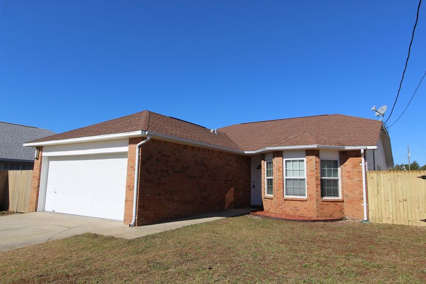 MOVE-IN READY! Fantastic Home with an Open Floor Plan, Vaulted Ceiling, and Split Bedrooms just a few minutes from Hurlburt's Main Gate! Spacious living room with sliding glass doors that lead out to an open patio. Kitchen is open to the living room w/plenty of cabinets and a pantry. A well-sized master bedroom with a master bath that has double vanities, a garden tub, a separate shower, a walk-in closet, and storage closet. Two additional bedrooms and a large full bath complete this perfect package. Indoor laundry room and bathrooms have storage closets. Fully fenced backyard with a small shed. The Trane A/C has transferable warranty plan available. Buyer to verify measurements. Call today to see this home before it's gone!