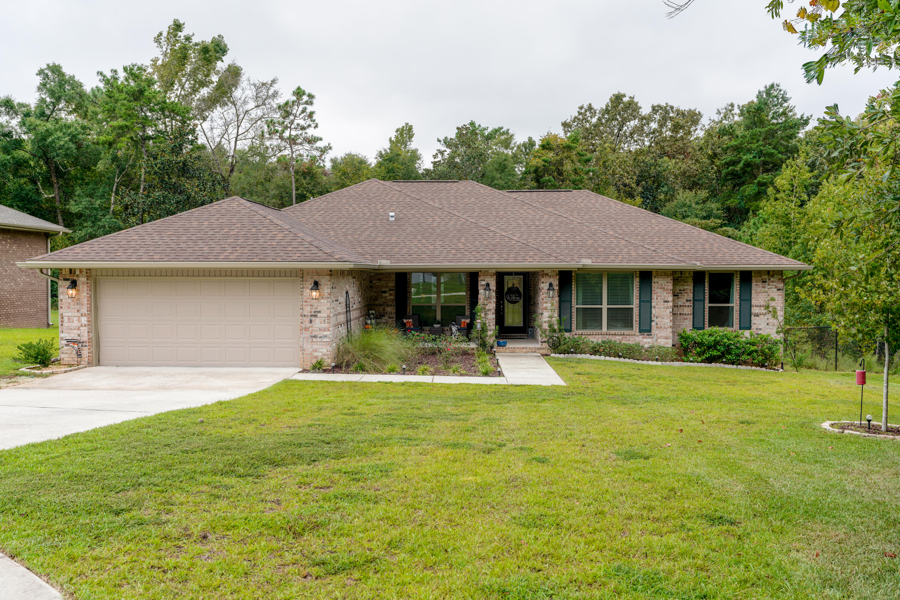 Well maintained 4-bedroom 2-bathroom house located on a cul-de-sac and just under 3,000 sq ft total. Built in 2021,it features a large backyard, a split floor plan, covered front patio, carpeted bedrooms, and vinyl flooringin the main living areas. The master bedroom has a tray ceiling, as well as a bathroom with a garden tub,separate shower, and double vanity sinks with his and her closets. The living room opens into the kitchen and two additional multipurpose rooms, which can be used as either a home office, dining room or family room to name a few. The kitchen features stainless steel appliances, granite countertops andbreakfast bar. Located in desirable neighborhood, close to schools, shopping centers and parks. It's approximately 17 mi to Duke Field and 30 mi to Eglin AFB.