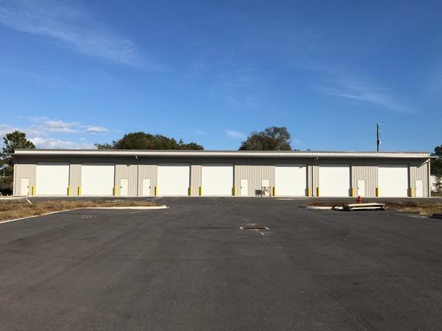 New warehouse/flex space complex off of Skipper Ave on Royster Loop. (Legal address is 306 Duval) First warehouse totals 8750sf. Can be divided into units of 1250sf, 2500sf, 3750sf, 5000sf, 6250sf, 7500sf, or 8750sf. Another 7500sf bldg. to be erected in the future. Each 1250sf space is plumbed for a bathroom. Landlord to install a firewall where needed. Each 1250sf unit has one 16' x 16' overhead door and one personnel door. Plenty of common parking. Landlord can add office space at Tenant's expense.Warehouse design and parking are attached under Documents.