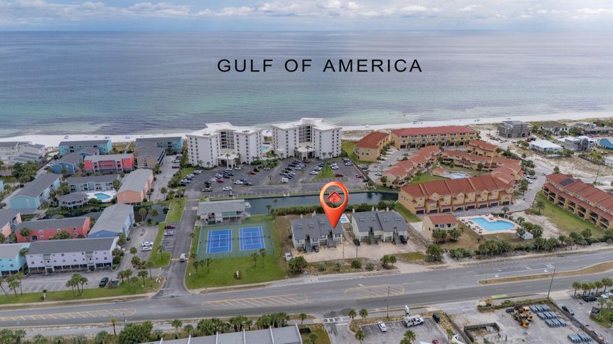 GULF VIEWS!! Discover your ideal beach retreat at 1550 Via Deluna Dr #D, a turnkey, end-unit townhome in the intimate 8-unit Santa Rosa Villas complex featuring 2 bedrooms, 2 full baths, and 1,214 sq ft of comfortable coastal living. On the main level you'll find an open living/dining area, well-appointed kitchen, guest bedroom with full bath, and a covered balcony that invites indoor/outdoor enjoyment. Upstairs, the spacious master suite includes an ensuite bath and a private second balcony with water views. Downstairs, a generous 1-car garage with interior access provides storage for vehicles and beach gear. Sold fully furnished with kitchenware, linens, and decor, and with a history of never being rented, the home is truly move-in ready.