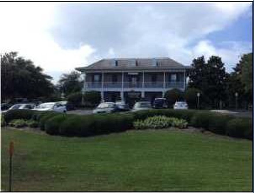 This Property is a freestanding Class A building located on Hwy 98 with a marque sign available. This is a second floor unit with 9 separate Executive Offices, conference room, break room and his and her bathrooms. The building has an elevator to the second floor.