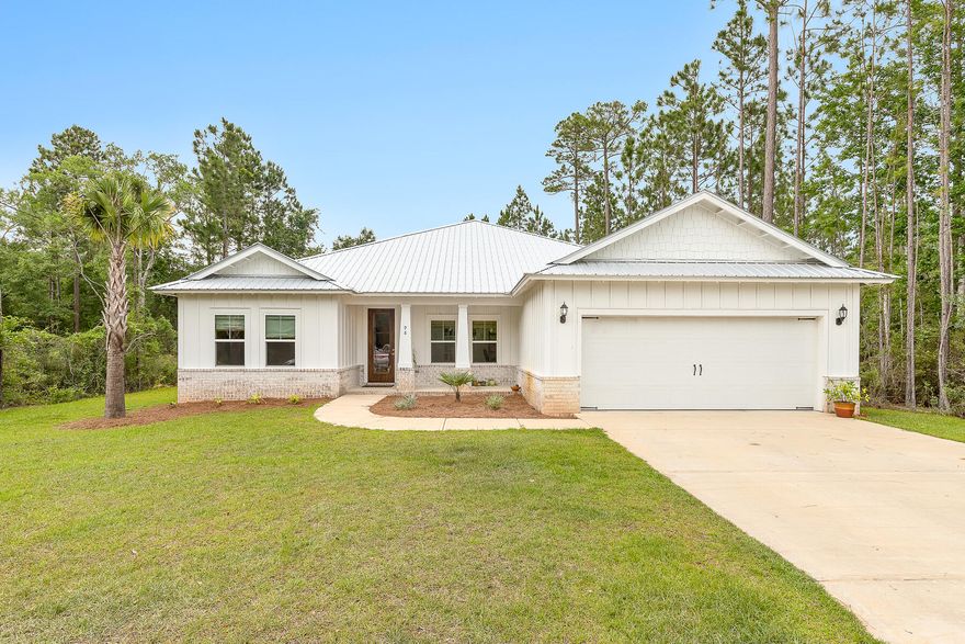 One year new beautiful Bear Creek Home with many upgrades, the homes exterior features include Hardiplank siding, irrigation system with well, exposed rafter tails, metal roof, tongue and groove stained porch ceilings, fully screened back porch. The interior of this home features a bonus room perfect for a home office or formal dining room, upgraded lighting, granite counters, custom cabinets just to name a few. Bear Creek is the closet new development to the 331 bridge making it a quick and scenic drive to the beaches of South Walton, Scenic Highway 30a, Choctawhatchee Bay public boat ramp and fishing pier as well as the new waterfront county park.