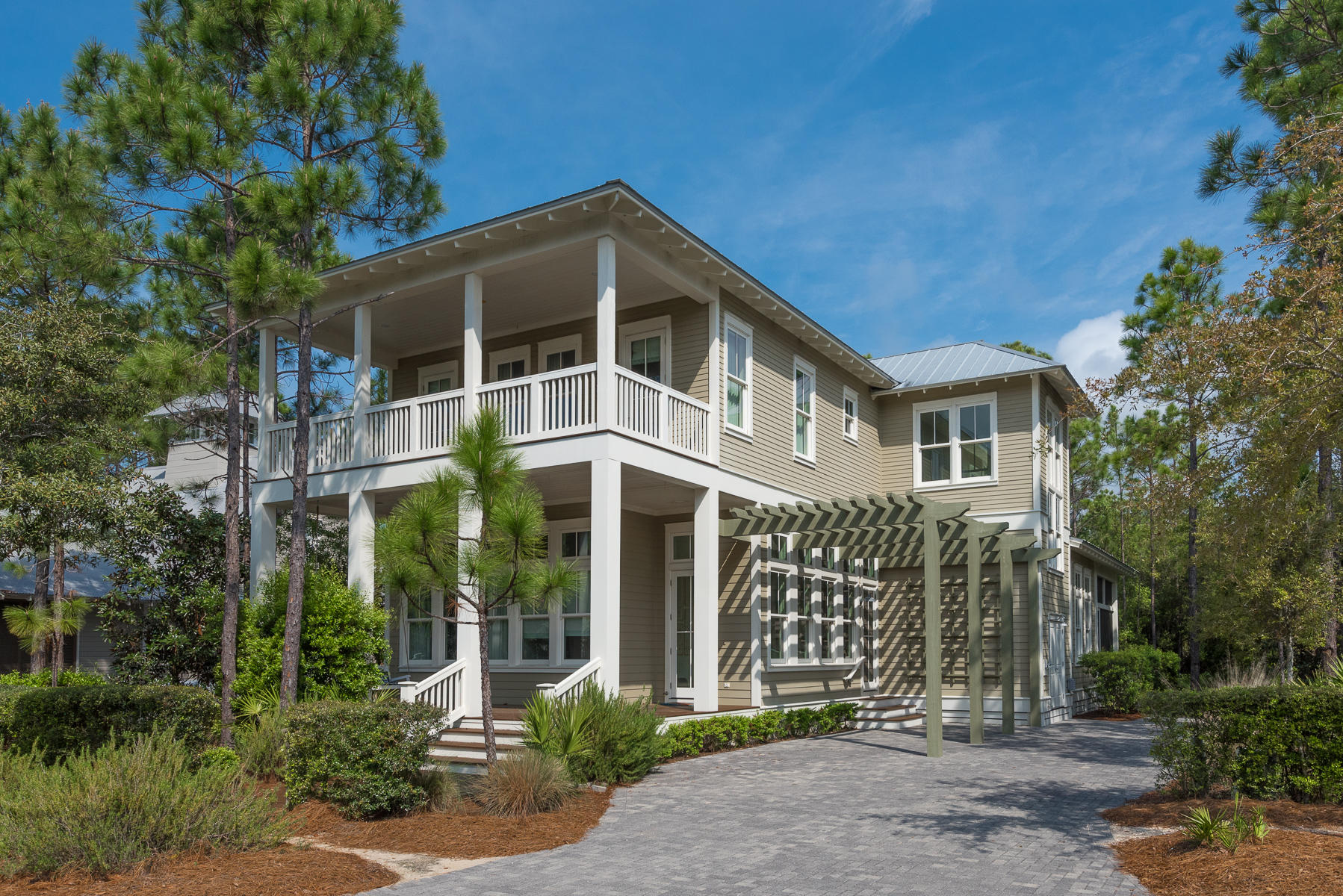 Exquisite home from Romair Construction in Phase III of the vibrant WaterColor community! This custom beach retreat is tucked away on a large lot on a quiet cul-de-sac just minutes from popular community amenities including Camp WaterColor and multiple swimming pools. Over 3,400 sq. ft. of beautifully designed living spaces with 4 BR and 4.5 BA provide ample room for family and friends to relax. Design features include open concept living and dining, a fully-equipped chef's kitchen, a spacious screened porch with an outdoor fireplace and a second floor bonus sitting area with built-in bunks. Special finishes include soaring 12' ceilings throughout, gorgeous hardwood floors, shiplap walls, built-in shelves, marble countertops and custom cabinetry. Home on a large lot with plenty of room to