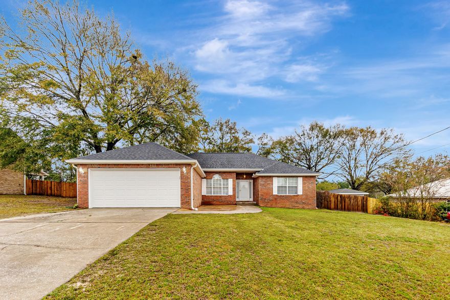 Great Home! Great Location! This lovely 3 bed/2 bath all brick home with a new roof recently installed (2025) is waiting for its new owner. Located in South Crestview, this home features a split-floor plan with ample space for the entire family & entertaining friends with a formal dining room and/or spacious breakfast bar for mealtimes. The kitchen has a built-in desk, SS appliances, tiled floor, indoor laundry room, & extra wide pantry. The living area has bamboo flooring, a beautiful gas fireplace for those cool nights, mid-wall TV mount/outlet, & French doors leading to the spacious fenced back yard & patio area. The large Master Bed/Bath is located off the kitchen & has a private water toilet, linen closet, double vanity, step-in shower & walk in closet. Two car garage has pull-down attic stairs for extra storage. Home has gutter covers for easy maintenance. In the evenings or on the weekends, enjoy & entertain in your backyard which features an outdoor kitchen and hot tub for relaxing. AND you can raise chickens for your very own fresh eggs with the chicken coop in the back yard. Call today to see before it's gone!