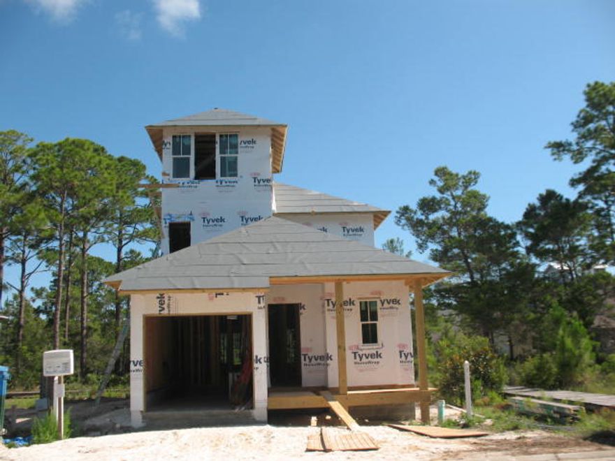 Located right across from the community pool and beach boardwalk, this unique Huff Cottage also offers a 8.6' x 15' third floor tower WITH GULF VIEWS!! This great floor plan offers first and second floor master suites, second floor sitting area, bunks, 10' ceilings, hardwood floors throughout, cottage V-groove, granite countertops, GE Monogram Appliances and custom cabinetry. This is a great opportunity to own in a great location in Watersound West Beach! Estimated completion date is 11.15.2014. FLOORPLAN MAY BE FOUND IN DOCUMENTS