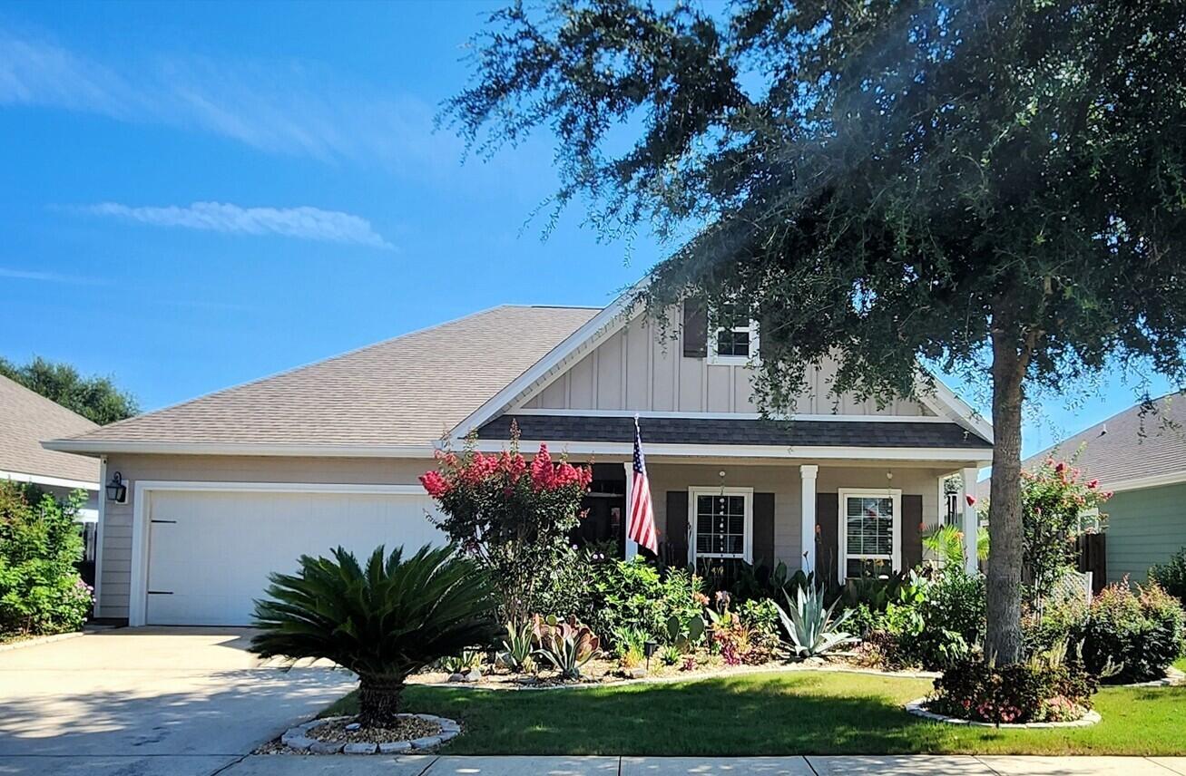 Beautiful touches inside and out make this exceptional Hammock Bay home on Central Park a must-see. This well maintained Bonaventure is a single-story split floor plan with an open concept. Hardwood floors, tiled bathrooms, crown molding, and tray ceilings in both the living room and the extra-large 26x11 primary bedroom are just a few of the many features. The large front porch, lush tropical gardens, screened porch, and private backyard oasis with patio and firepit make outdoor living sheer perfection. You'll especially love the lot backing up to Central Park, which means no neighbors in back! Welcome to your dream home! ALL appliances and kitchen island convey. Just 17 miles to some of the most beautiful sugar-sand beaches on the Emerald Coast, and 29 miles to Eglin AFB.