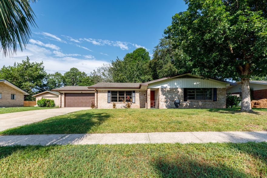 NEWLY RENOVATED! This home is in the desirable neighborhood of Kenwood and is a short walk to the elementary school. This beautiful home has a fantastic floor plan with a wide open front living/dining area. A brand new kitchen has plenty of work surface for family gatherings and is presented with sporting stylish light fixtures, new cabinets, sink, hardware, LVP floors throughout, granite counters & all new stainless steel appliances. The large master bath is all new as well with double sinks & a large shower. Driveway is large enough to house RV, boat or other toys. Roof 10yrs old, HVAC fairly new, carpet new and interior/exterior paint means low maintenance and more time enjoying this beautiful home. The backyard is fenced and has a nice patio. There is plenty of room for a pool.