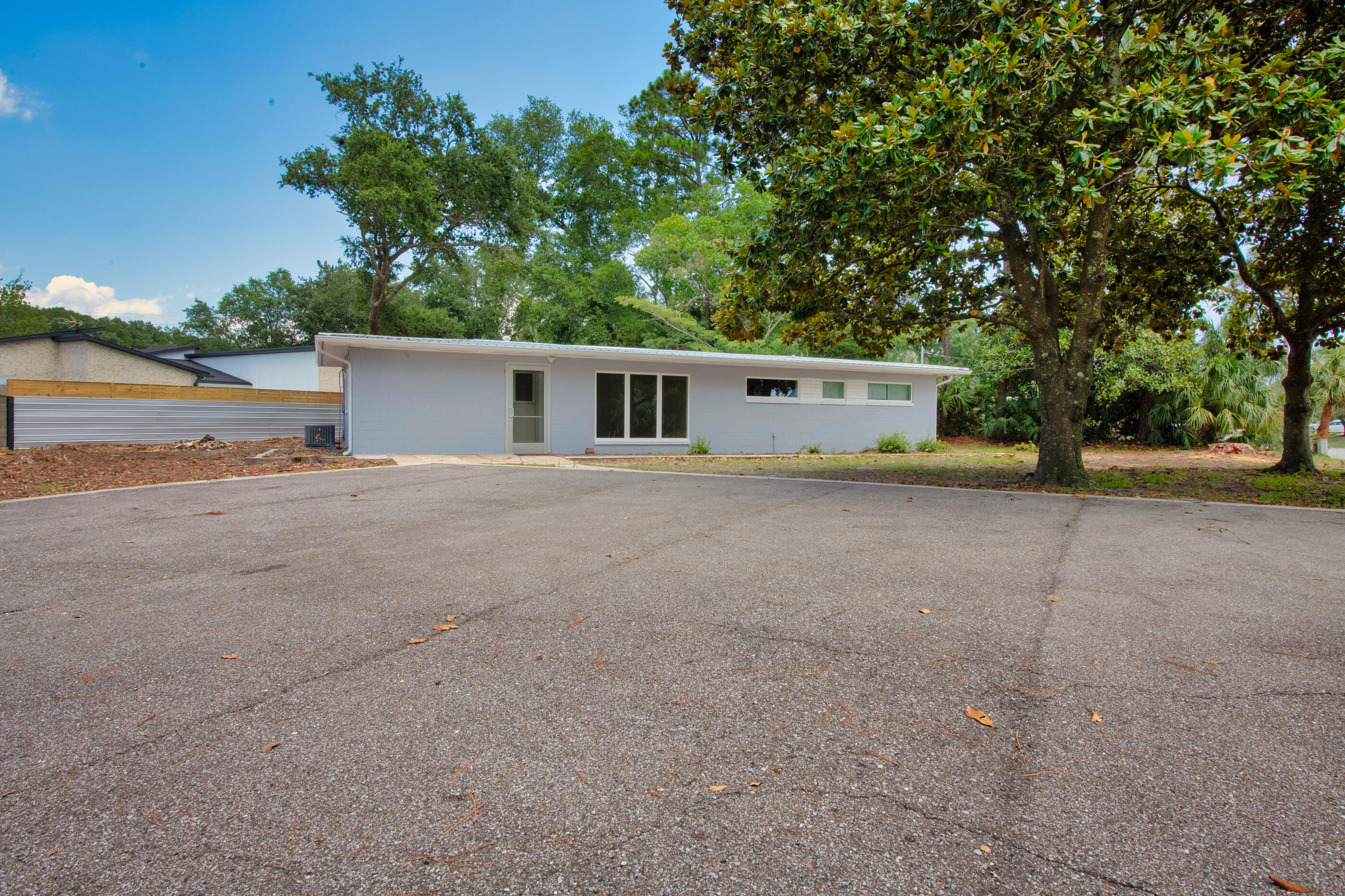 Great commercial office building on a large corner lot with plenty of parking. Zoned MX-1 (Mixed Use). Individual, private offices as well as a kitchen, utility closet, full bath and a half bath. Bright and open entrance area, tile flooring throughout the building.