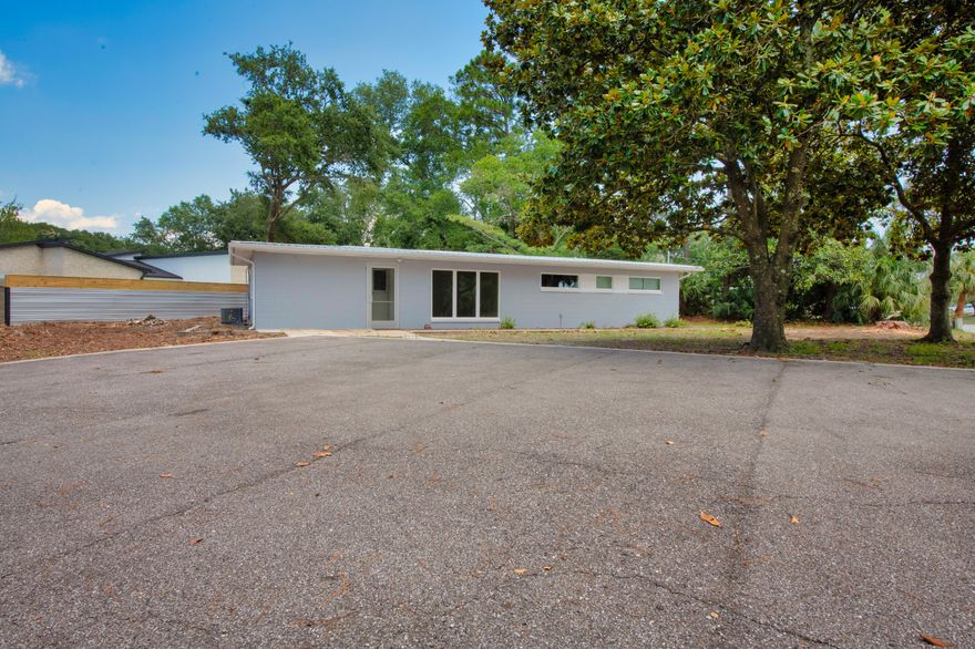 Great commercial office building on a large corner lot with plenty of parking.  Zoned MX-1 (Mixed Use).  Individual, private offices as well as a kitchen, utility closet, full bath and a half bath.  Bright and open entrance area, tile flooring throughout the building.