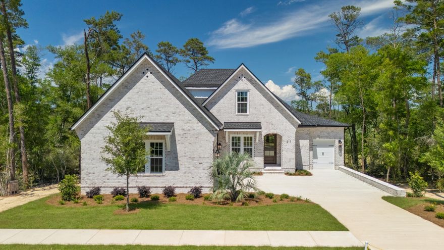 Welcome to this highly sought-after all-brick Daphne floor plan, located in the newest phase of the master-planned community of Deer Moss Creek. This spacious home features 4 bedrooms, 3.5 baths, an office with custom built-ins, and a versatile flex space -- perfect for a home gym, playroom, or media room.The open-concept design is highlighted by an XL Ignite 60'' Linear Fireplace with a beautiful brick surround, adding both warmth and elegance to the living area. The gourmet kitchen features stunning quartz countertops, while the hardwood floors throughout exude modern luxury. The home also offers an extended nook and porch, perfect for enjoying indoor and outdoor living.With a 3-car garage, there's plenty of space for vehicles and storage, and the perimeter lot provides added  privacy and serene views.

Special Offer: The builder is offering a $25,000 price reduction if under contract by 12/31/24  and $5000 towards closing costs, a limited-time opportunity to own this exceptional home at an unbeatable value!. 

Deer Moss Creek Phase 11 boasts a wealth of amenities, including a community room, resort-style pool, basketball court, playground, gazebo, and scenic walking trails, creating a perfect environment for relaxation and outdoor recreation.

Don't miss out on the opportunity to own this exquisite home in one of the area's most desirable communities. Schedule a showing today!