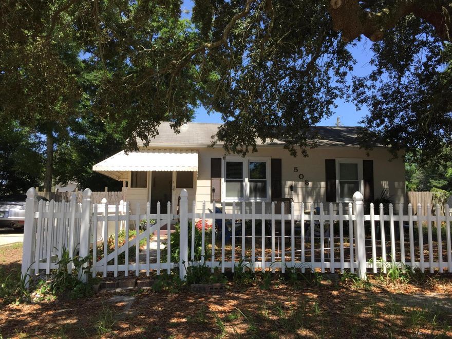 THIS ENCHANTING 2BR/1BA FLORIDA COTTAGE IS ONE NOT TO OVERLOOK. IT HAS INVITING APPEAL BOTH INSIDE AND OUT. LOCATED IN THE DESIRED NAVY POINT. THIS CHARMING PROPERTY IS NESTLED AMONG MATURE OAK TREES SURROUNDED BY A WHITE PICKET FENCE. IT HAS SEVERAL UPDATES GALORE. NEW OR NEWER FLOORING, WINDOWS, AC COMPRESSOR, PRIVACY FENCE AND METAL HURRICANE SHUTTERS. UPON ENTERING THE HOME YOU WILL GO THROUGH A DELIGHTFUL SCREENED PORCH. IT IS A COZY PLACE TO ENJOY THE BREEZY MORNINGS WHILE SIPPING COFFEE.THIS HOME IS WITHIN WALKING DISTANCE TO THE NAVY POINT PARK WHERE YOU CAN PICNIC, FISH, WALK YOUR DOG,TAKE KIDS TO THE PLAYGROUND, AND EVEN LAUNCH YOUR BOAT OR JET SKI.IT IS ALSO CONVENIENT TO THE BASES,HOSPITAL,RESTAURANTS, AND SHOPPING. YOU DON'T WANT TO MISS THIS OPPORTUNITY ON THIS FABULOUS HOME!