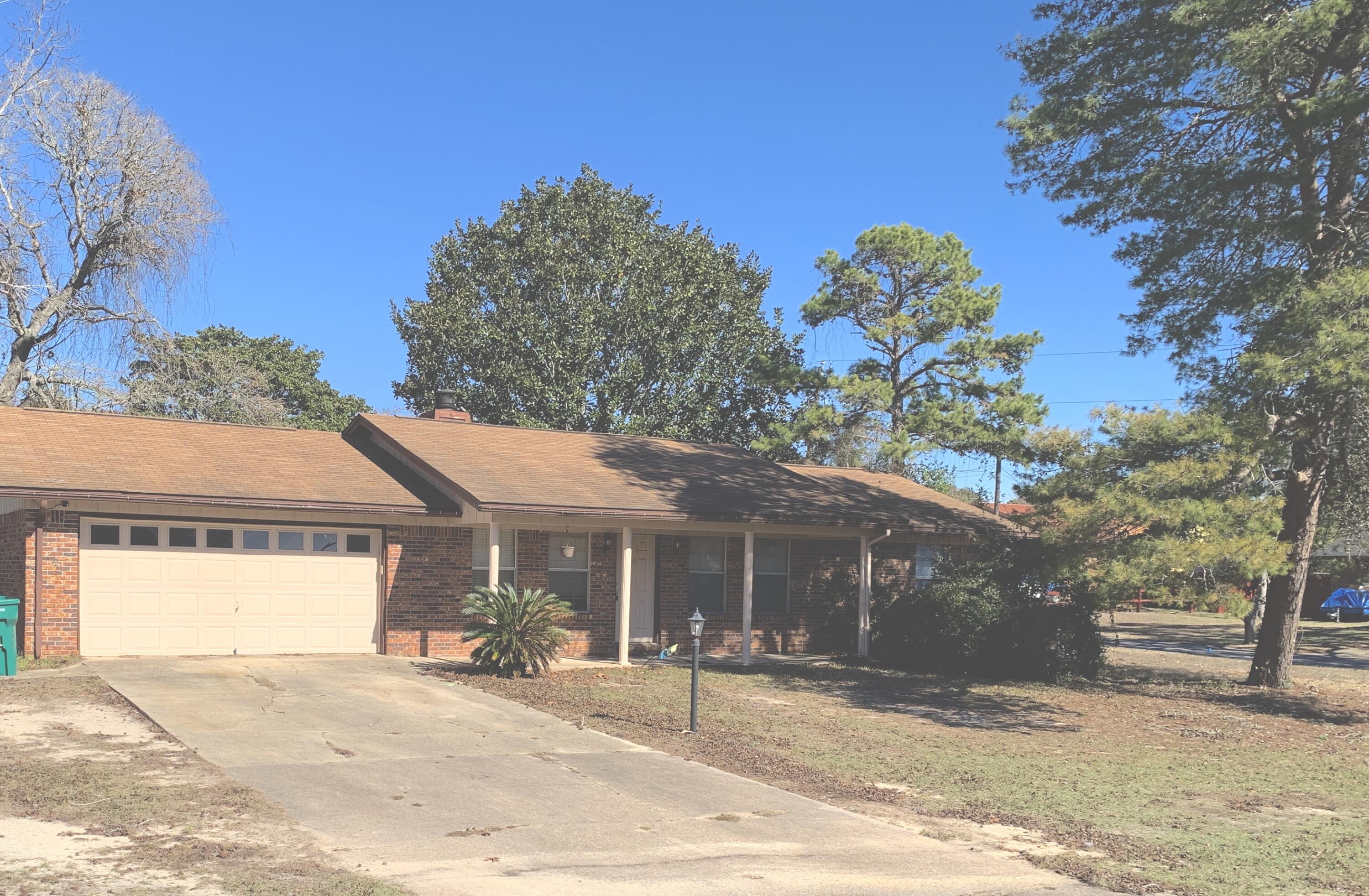 This brick rancher with two car garage on a corner lot can provide the perfect spot for nestling into that comfy chair next to the living room fireplace, watching the game with friends, entertaining in the large privacy fenced back yard, or a little R & R before relaunch to the next activity in and around the area. Easy commute to Shalimar Elementary, Meigs Middle school and Eglin. There is a bonus room located behind the garage for storage or may be made into additional living space. Screened back-yard covered porch with pet door. All measurements are to be confirmed by buyer.