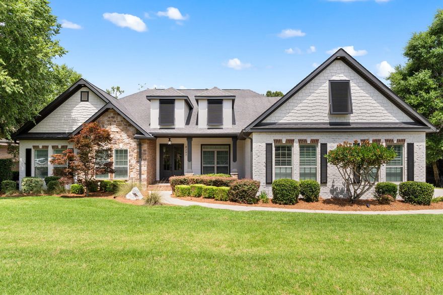 Welcome to this stunning, fully remodeled residence nestled in one of Pensacola's most sought-after gated communities--Nature Trail. Situated on nearly half an acre, this expansive 4-bedroom, 4.5-bathroom home spans over 3,700 square feet and includes a versatile media room that can easily serve as a fifth bedroom. No detail has been overlooked in this designer renovation. Step inside to discover elegant Engineered Oak wood flooring throughout, leading you into a custom-designed kitchen featuring; custom cabinetry, Cambria Quartz countertops, and equipped with high-end appliances--perfect for entertaining or everyday living. The spacious primary suite is a true retreat, complete with a spa-like en-suite bath that boasts a custom tiled shower, separate soaking tub, electric fireplace, and an expansive walk-in closet. The other three bedrooms reside down their own private hallway with a beautiful hall bath, perfect for entertaining. Two guest bedrooms share a spacious full bathroom, with the third having its own ensuite. Another one of the great features of the home is it's in-home movie theatre with a full bathroom which can be used as a 5th bedroom. One of the home's standout features is the 450-square-foot screened-in back patio, ideal for year-round enjoyment. From here, take in views of the beautiful gunite pool, complete with a waterfall feature and sun ledge, creating your own private oasis. Located in Nature Trail, residents enjoy 24-hour security, a resort-style pool, clubhouse, playground, and tennis & pickleball courtsall just moments from shopping, dining, and top-rated schools in Pensacola's fastest growing areas. This home is a rare blend of luxury, comfort, and location. Schedule your private showing today to experience everything it has to offer!