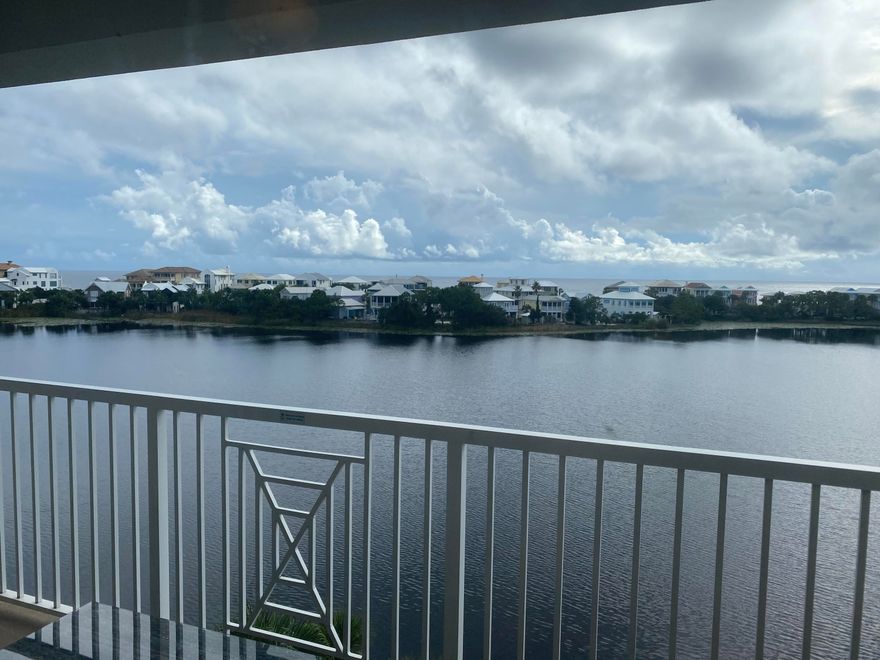 The views from this 5th floor unit will amaze and impress you. Looking across Lake Carillon to the Gulf of Mexico and surveying the entire Carillon Beach community from the balcony, adorned with modern outside furniture, will become a favorite pass time of the owners of this unit. The wildlife on the lake and the activity of the community will be in full view.  This one bedroom, one bath unit also has a living area and kitchen to add to the convenience.  It has a king size bed and a queen sleeper sofa. This is a great starter investment property or just an excellent private retreat and a good excuse to come to the beach as often as possible.