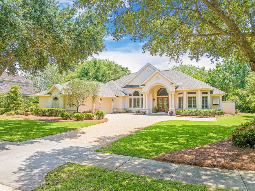 JUST REDUCED $150,000! A NEW ROOF and NEW PORCH SCREENS were just completed on this exquisite three bedroom home with an additional office in the prestigious Stonebridge neighborhood of Kelly Plantation, which sits on a sprawling .58-acre corner lot, offering privacy, charm and exceptional amenities. With its stately stucco exterior, shingle roof and dedicated golf cart garage, the property exudes sophistication while providing ample space to add a pool. Designed for both relaxed living and elegant entertaining, the interior features warm and inviting family spaces alongside a grand formal living and dining area. The kitchen is well-appointed with a spacious island, raised breakfast bar and KitchenAid appliances, all complemented by a neutral color palette hat allows for effortless customization. Multistage crown molding, ceiling treatments and a deluxe lighting package add to the home's refined character. A gas fireplace in the living room is a cozy complement in the cooler months of winter. A highlight of the property is the expansive 802-square-foot screened porch, which along with the interior spaces, have a wired sound system and are perfect for enjoying Florida's beautiful climate year-round. Additional features include tile flooring, plush carpeted bedrooms, a paver patio and a central vacuum system. Additionally, this home faces a large park in the center of an oversized round-a-bout, so the front yard view and curb appeal is impeccable. Located within the gates of Kelly Plantation, residents enjoy championship golf, tennis, pickleball, a community pool, miles of walking trails and a private dock for paddleboarding and kayaking. The owners' clubhouse was recently remodeled, and this furnished space with outdoor grills is available for owners to reserve for private parties. Next door you will also find a fitness room and a separate yoga/pilates studio. Sports courts and 24-hour security complete this unparalleled lifestyle, with the beach, Whole Foods, Fresh Market and Destin Commons just a short golf cart ride away. Meticulously maintained by its current owners, this home offers an extraordinary opportunity to experience luxury living in one of Destin's most sought-after communities.