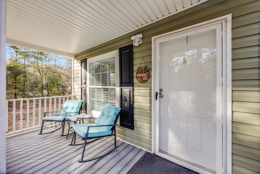 This beautiful well maintained mobile home sits in a quiet peaceful setting.  With two bedrooms, two bathrooms, an open living and kitchen area.   Features a covered porch, perfect for outdoor seating while enjoying the surrounding wooded setting.  Call for a showing today!