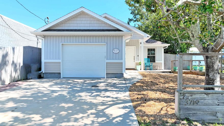 'CURRENTLY UNDER CONTRACT, SELLER WILL CONSIDER BACKUP OFFERS'  Welcome to your dream home, ideally situated just blocks away from both the serene Grand Lagoon and Gulf Of Mexico. Newly (2017) constructed residence combines modern design with a tranquil coastal beachy lifestyle.  This coastal retreat offers a rare combination of luxury and location, perfect for those seeking a modern lifestyle to the water.  Boasting 3 spacious bedrooms and 2 bathrooms, this fully furnished home is filled with natural light, showcasing open-concept living spaces that seamlessly blend indoor and outdoor living.  The level fenced park-like back yard which has been recently turfed with putting green, newer stone patio and pergola great for entertaining.  The heated and cooled garage has been converted to a